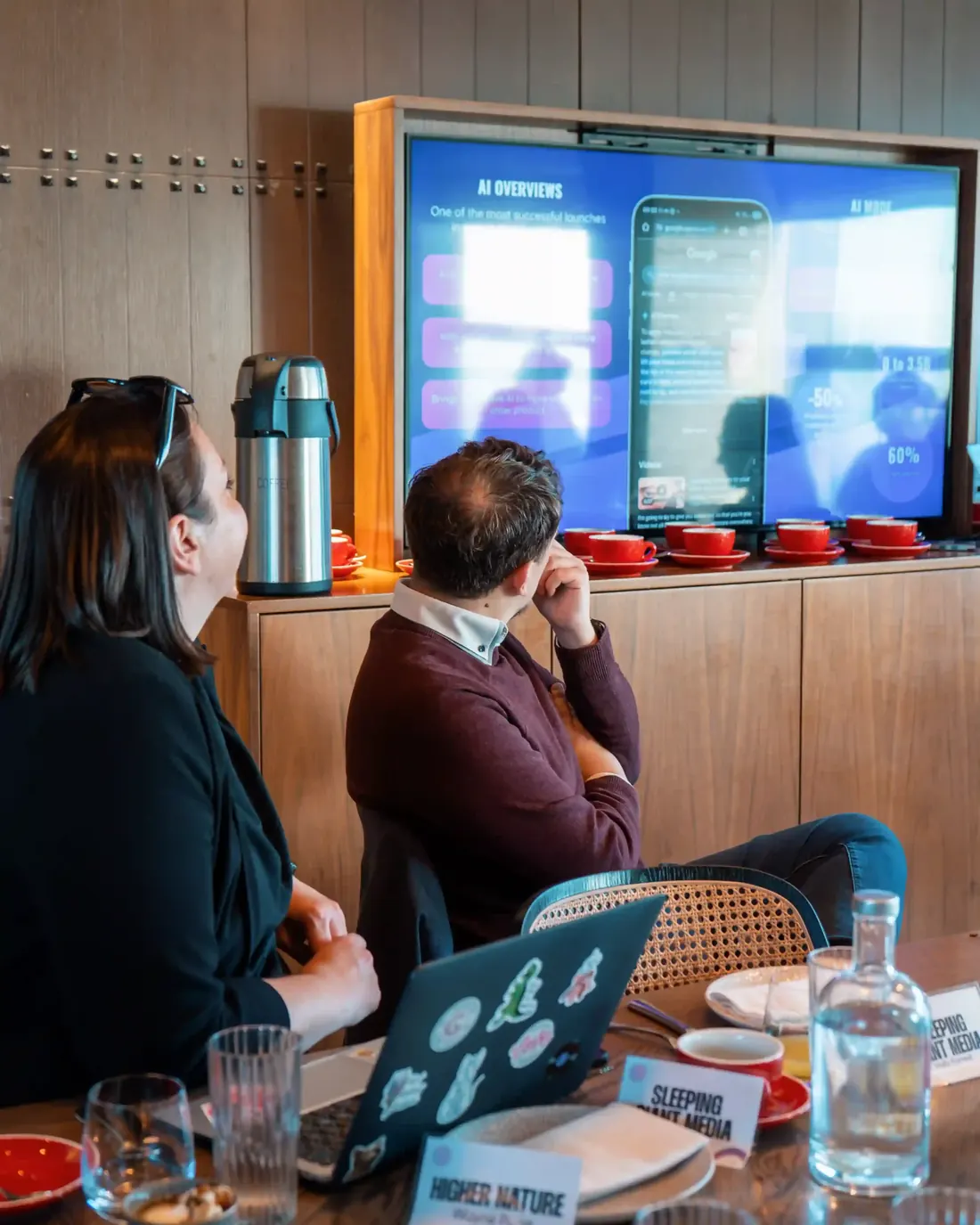 Attendees listening to a session